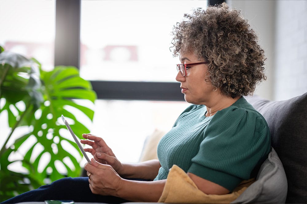 Female reading about cervical cancer